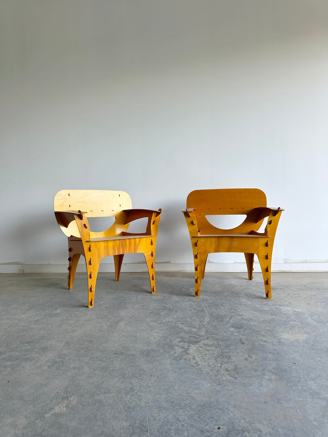Sculptural plywood Puzzle chairs by David Kawecki